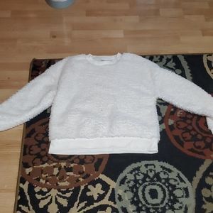 A white fuzzy long sleeve